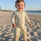 Sage UPF 50+ full-body baby swimsuit by Luca James Swim